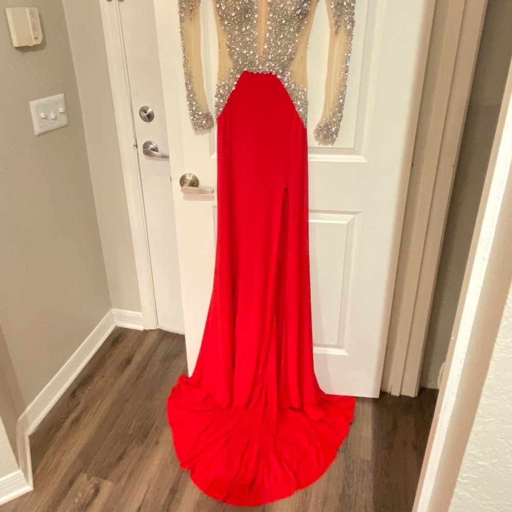 Sivalia Couture. Red and cristal accents on the top. Size 4